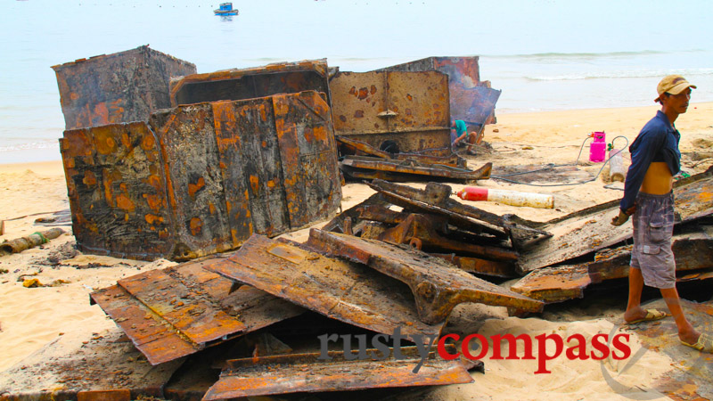 A former US military barge is broken up for scrap. Quy Nhon